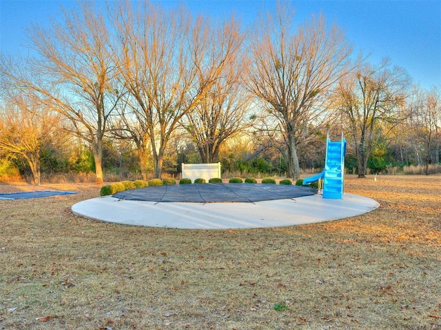 5900 N Choctaw Rd, Choctaw, OK 73020 - view of home's community with a lawn and a swimming pool