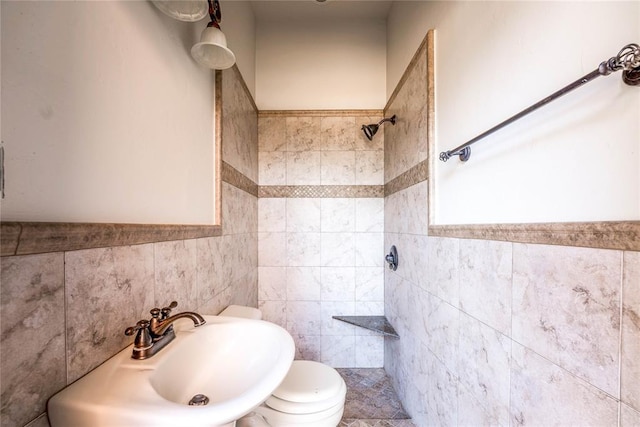 5900 N Choctaw Rd, Choctaw, OK 73020 - full bath with tiled shower, tile walls, and a wainscoted wall