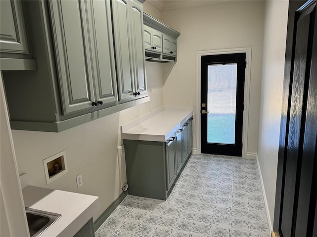 5900 N Choctaw Rd, Choctaw, OK 73020 - laundry room featuring cabinet space, washer hookup, and crown molding