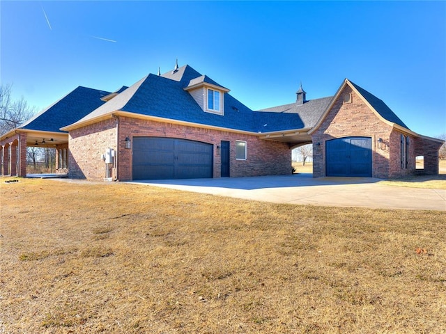 5900 N Choctaw Rd, Choctaw, OK 73020 - view of front facade with brick siding, a garage, driveway, and a front lawn
