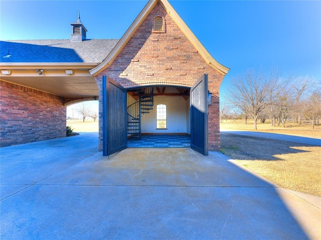 5900 N Choctaw Rd, Choctaw, OK 73020 - view of property exterior with a chimney and roof with shingles