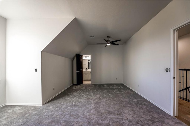 5900 N Choctaw Rd, Choctaw, OK 73020 - additional living space with carpet flooring, lofted ceiling, and a ceiling fan