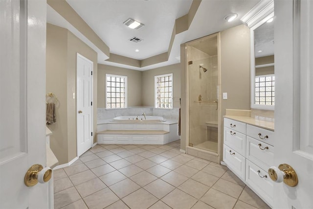 bathroom featuring tile patterned floors, plenty of natural light, vanity, and shower with separate bathtub