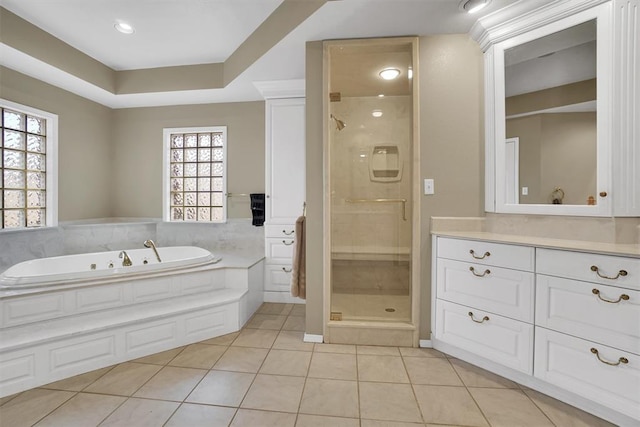 bathroom featuring separate shower and tub, tile patterned flooring, vanity, and a healthy amount of sunlight