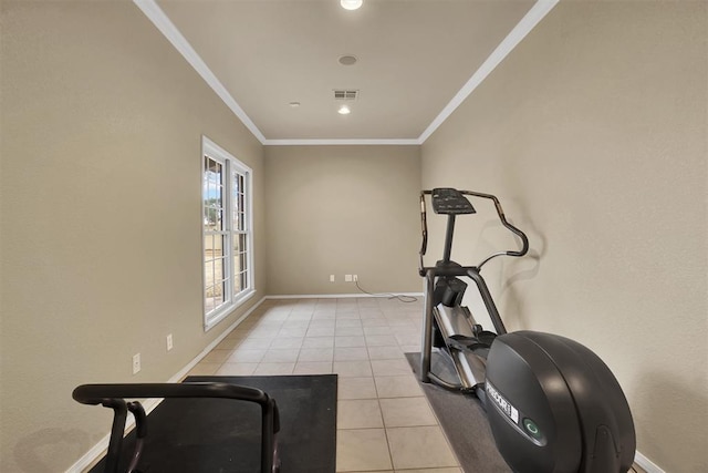 workout room with light tile patterned floors and crown molding