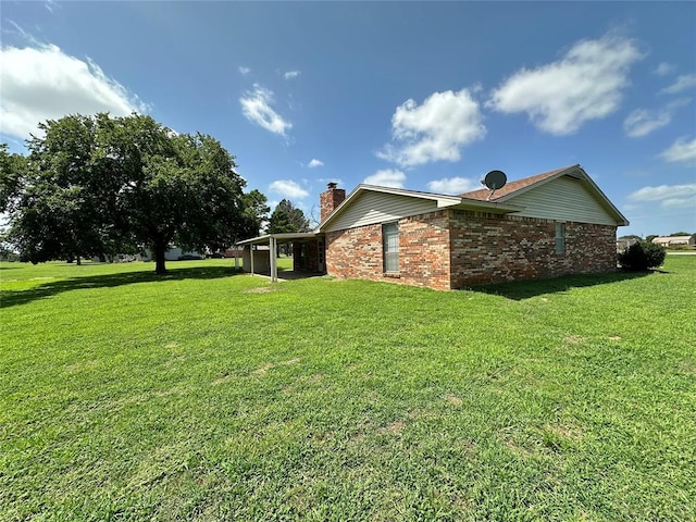 view of property exterior with a lawn