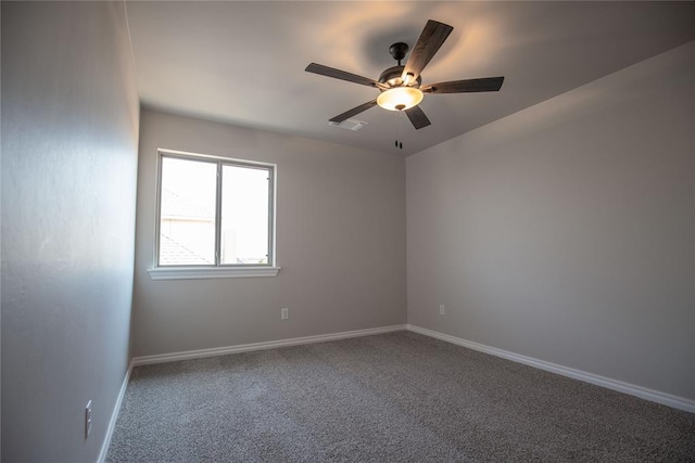 unfurnished room featuring carpet and ceiling fan