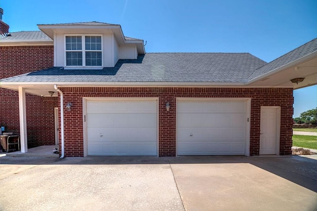 exterior space featuring a garage