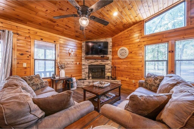 living room with wooden ceiling, wooden walls, hardwood / wood-style flooring, and a healthy amount of sunlight