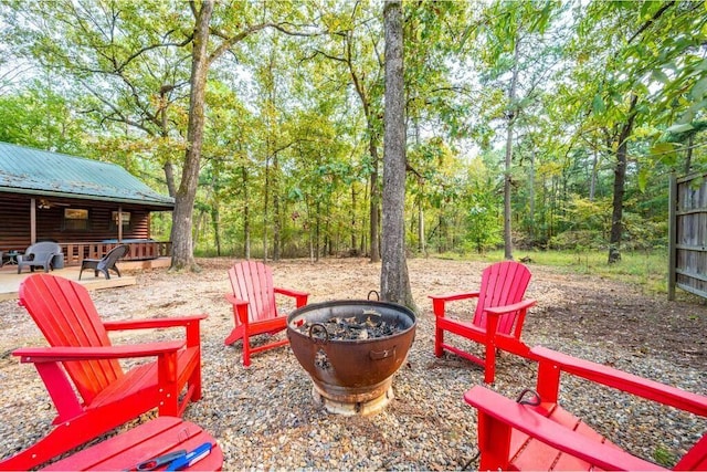 view of patio / terrace with a fire pit