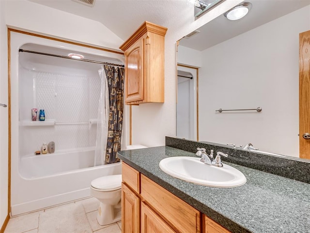 full bathroom with tile patterned floors, vaulted ceiling, toilet, shower / bath combo with shower curtain, and vanity