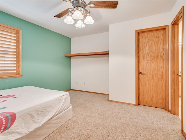 1419 W Royal Oaks Rd, Pauls Valley, OK 73075 - bedroom featuring carpet, a closet, and a ceiling fan