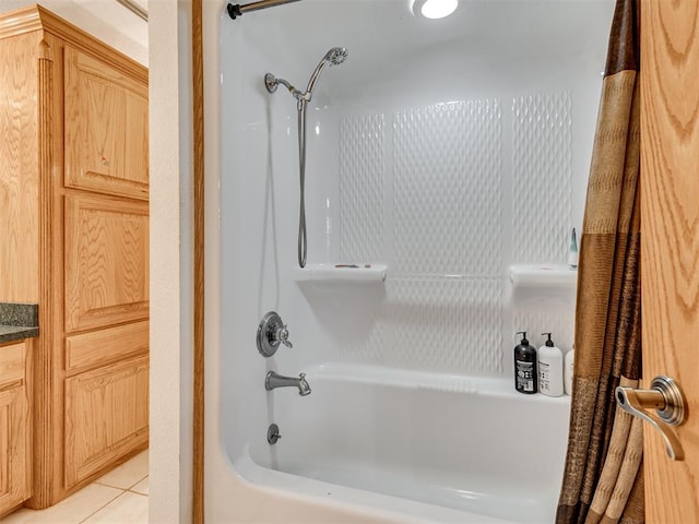 bathroom featuring tile patterned floors and shower / tub combo with curtain