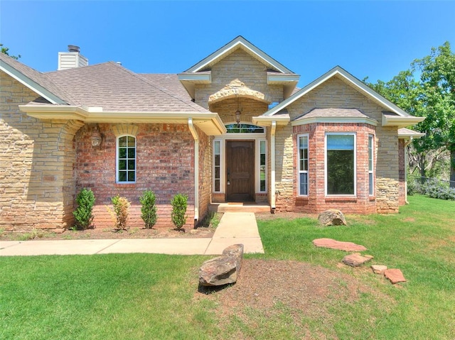 craftsman-style house with a front lawn