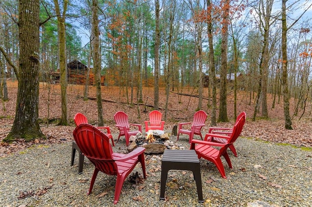 view of patio / terrace featuring an outdoor fire pit