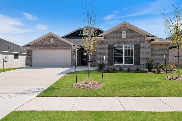 13256 Sawtooth Oak Rd, Choctaw, OK 73020 - view of front of house with an attached garage, driveway, a front yard, and brick siding