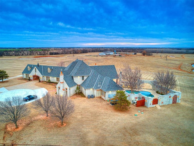 aerial view at dusk with a rural view