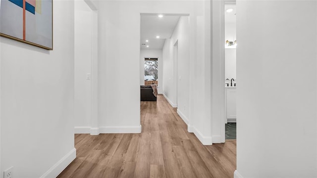 hall featuring light hardwood / wood-style floors