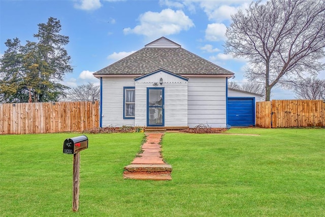 view of front of home with a front lawn