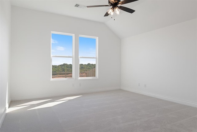 bonus room with plenty of natural light, ceiling fan, lofted ceiling, and light carpet