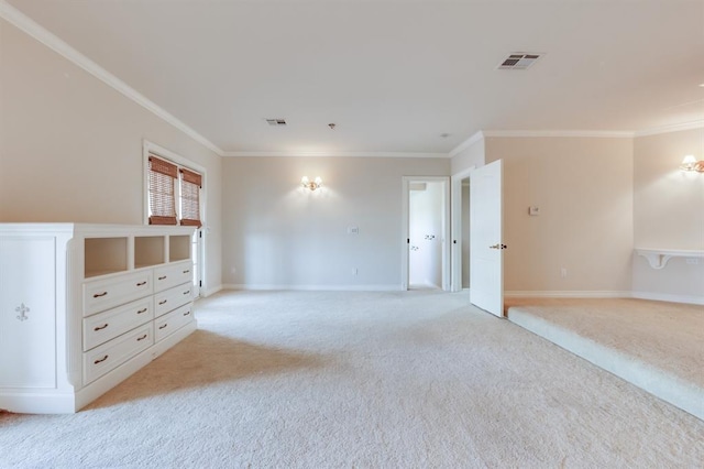 carpeted spare room with ornamental molding