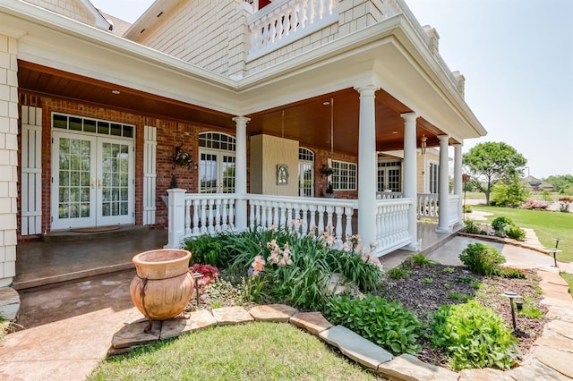 property entrance with french doors and a porch