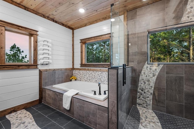 bathroom featuring wooden ceiling, tile patterned flooring, independent shower and bath, and wooden walls