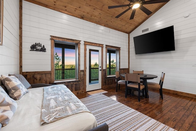 bedroom featuring hardwood / wood-style flooring, access to outside, vaulted ceiling, ceiling fan, and wooden ceiling