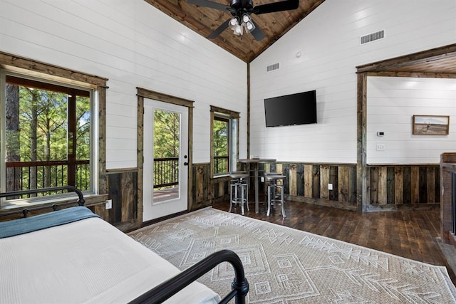 bedroom with access to exterior, wood ceiling, ceiling fan, hardwood / wood-style flooring, and high vaulted ceiling