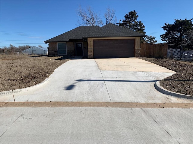 view of front of home with a garage