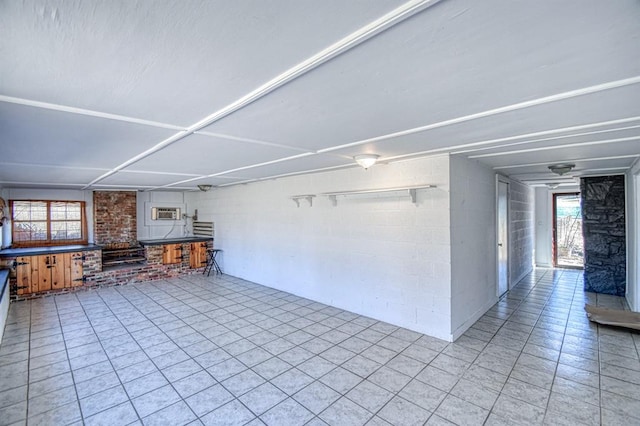 unfurnished living room with plenty of natural light