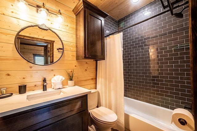 full bathroom with vanity, toilet, shower / bath combo, and wooden walls