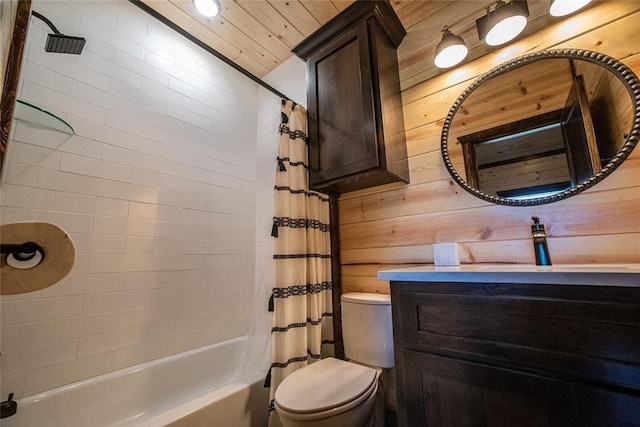 full bathroom featuring toilet, shower / bath combination with curtain, wooden walls, and vanity