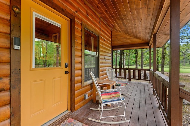 entrance to property with a porch