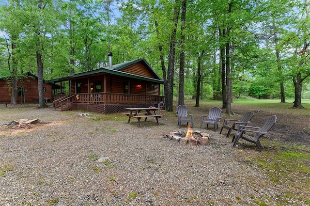 exterior space featuring a fire pit