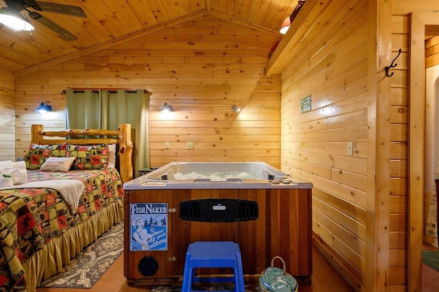 bedroom with wooden walls, wooden ceiling, and vaulted ceiling