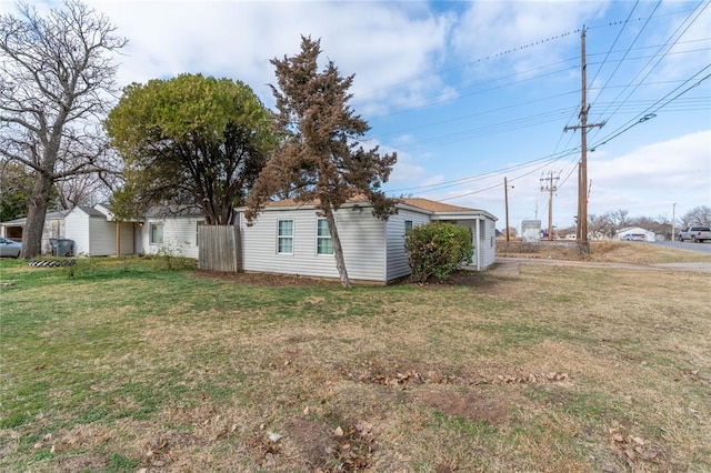 view of property exterior featuring a yard