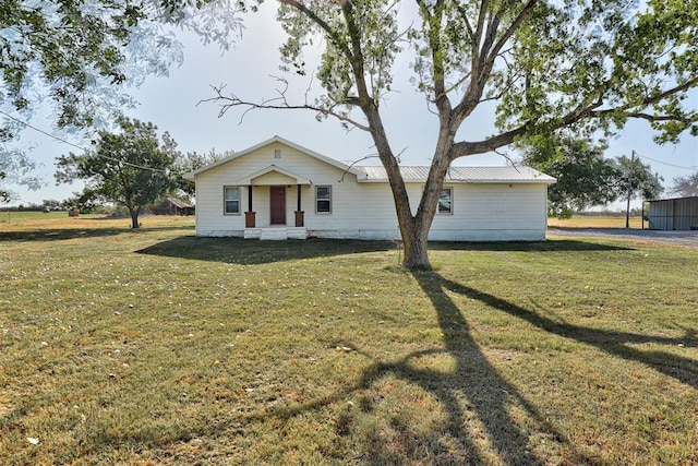 view of front of house with a front yard