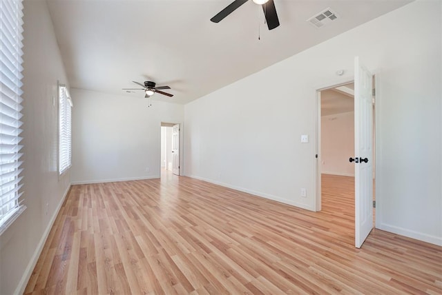 unfurnished room featuring ceiling fan and light hardwood / wood-style flooring