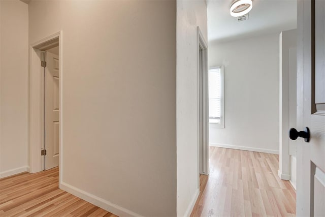 hall featuring light wood-type flooring