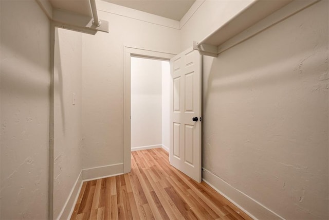 corridor featuring light wood-type flooring