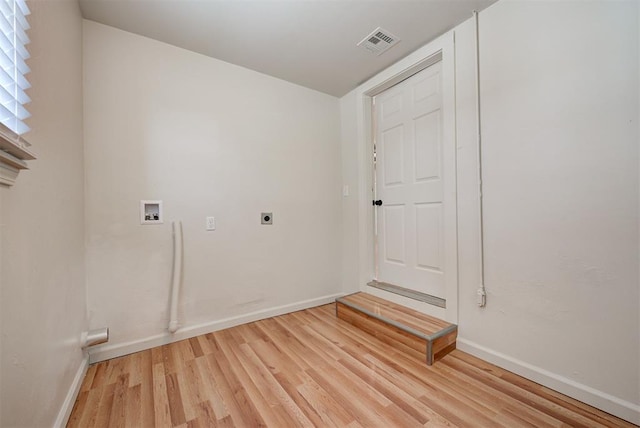 unfurnished room featuring light hardwood / wood-style flooring