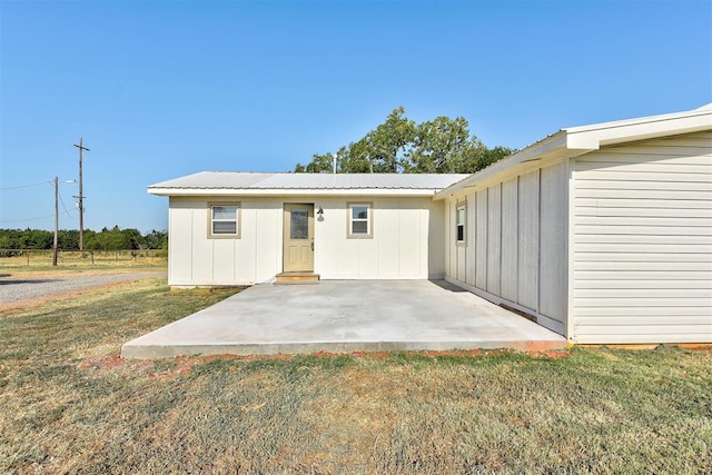 exterior space featuring a yard and a patio