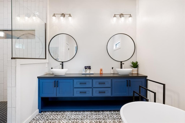 bathroom with tile patterned flooring, vanity, and independent shower and bath