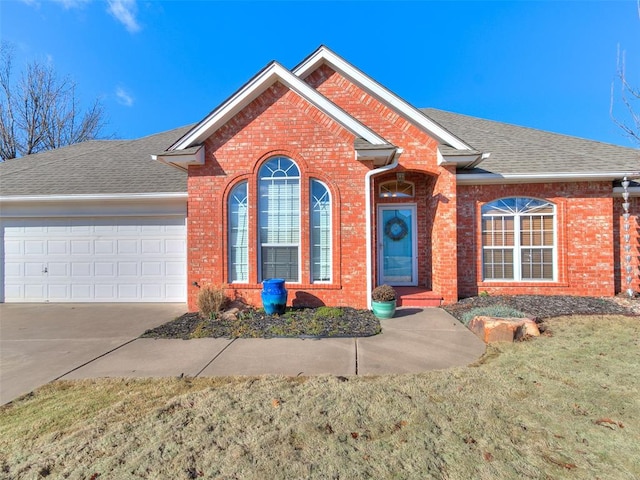 view of front of home with a garage