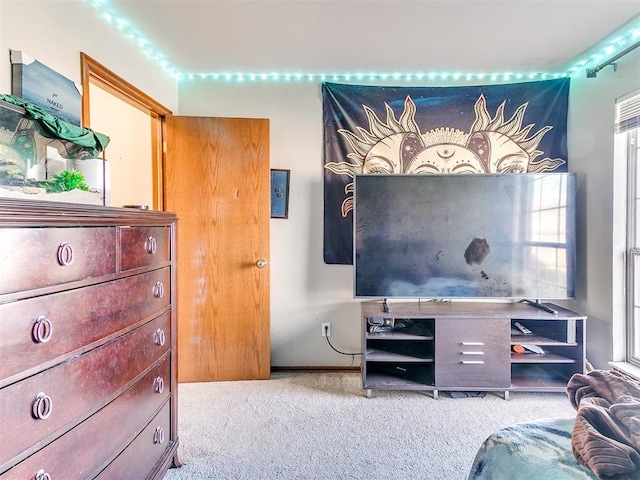 bedroom with light colored carpet