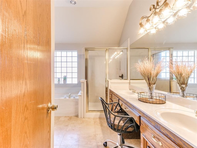 bathroom featuring plus walk in shower, a wealth of natural light, and vaulted ceiling