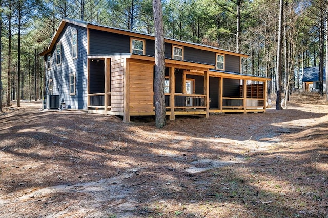 view of front of property featuring cooling unit