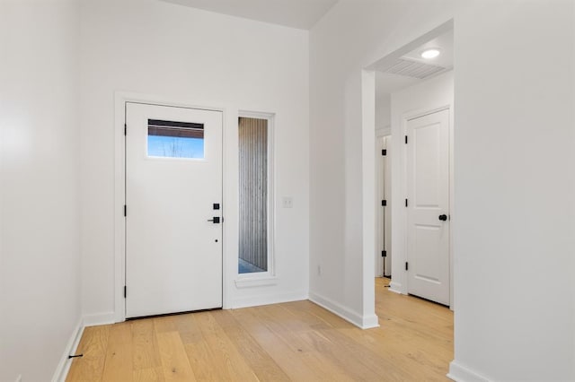 entrance foyer featuring light wood-type flooring