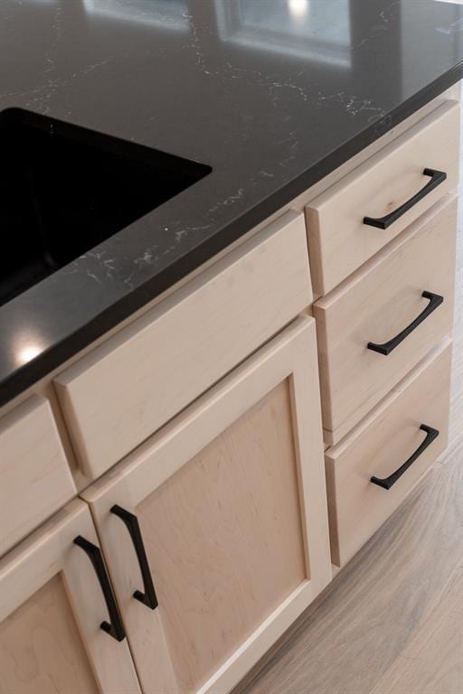 interior details featuring dark stone countertops